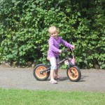 Kayley on her walking bike