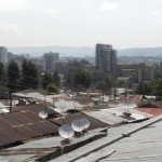 tin roofs looking out from HQ into the city