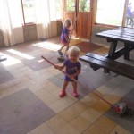 the girls mopping up the water after all the rain